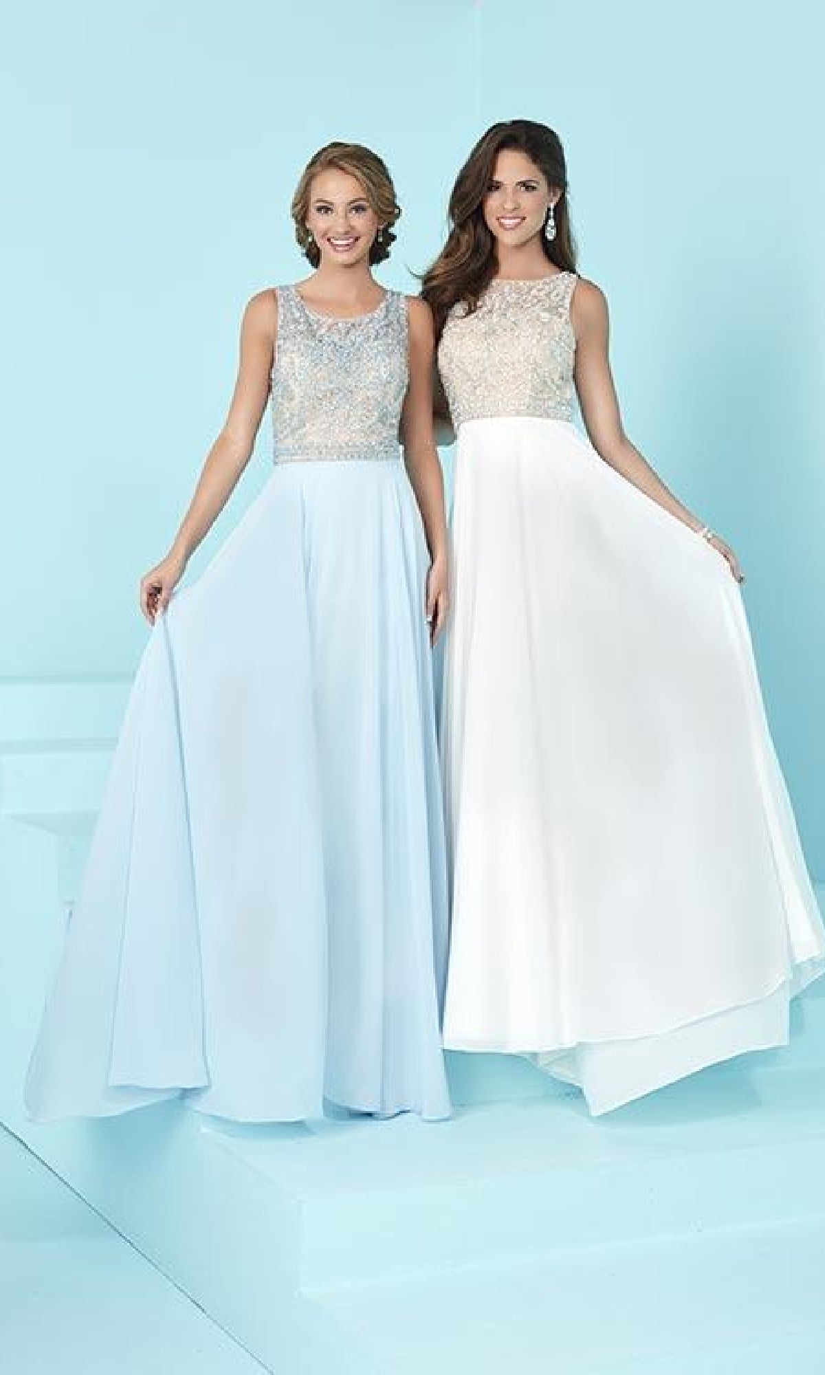 Two women pose against a light blue background in Backless Long A-Line Formal Gowns featuring sleeveless, embellished bodices—one wears light blue, the other white.